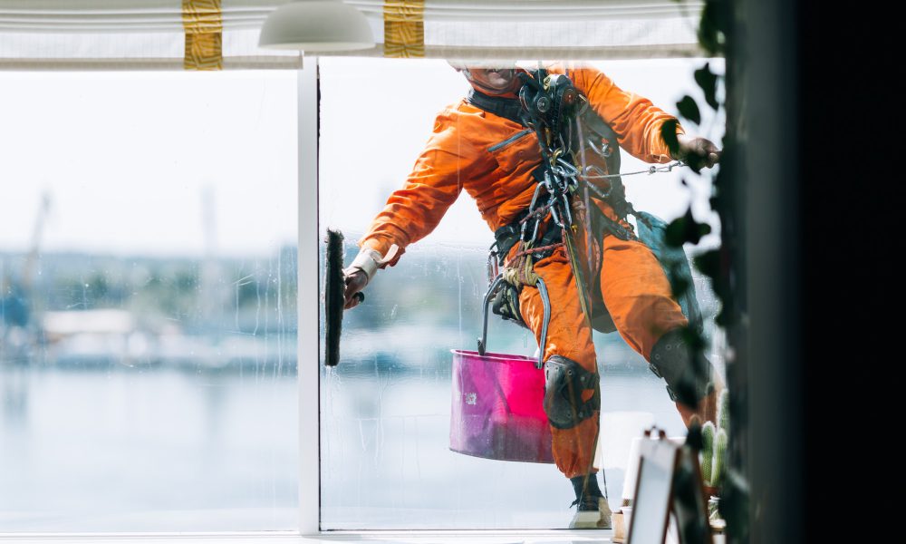 industrial-climbes-is-washing-glass-on-the-facade-of-a-skyscraper-inside-view.jpg